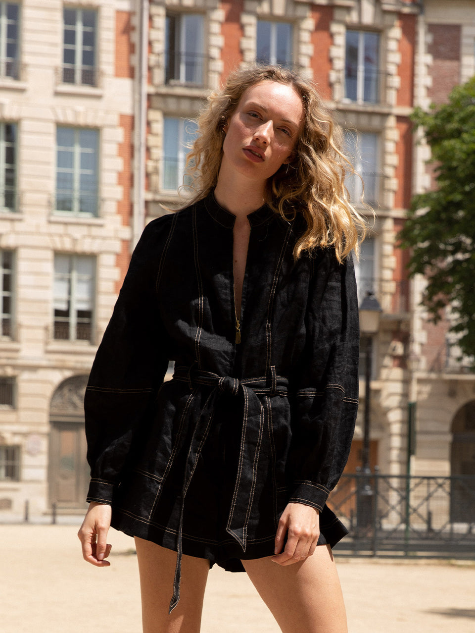 KIVARI Ada Playsuit | Model wearing playsuit in front of building