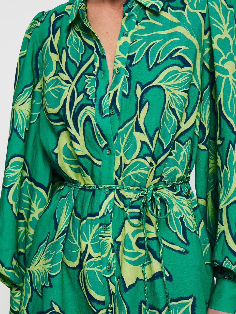 Fiora Shirt Dress KIVARI | Model wears green floral shirt dress close up