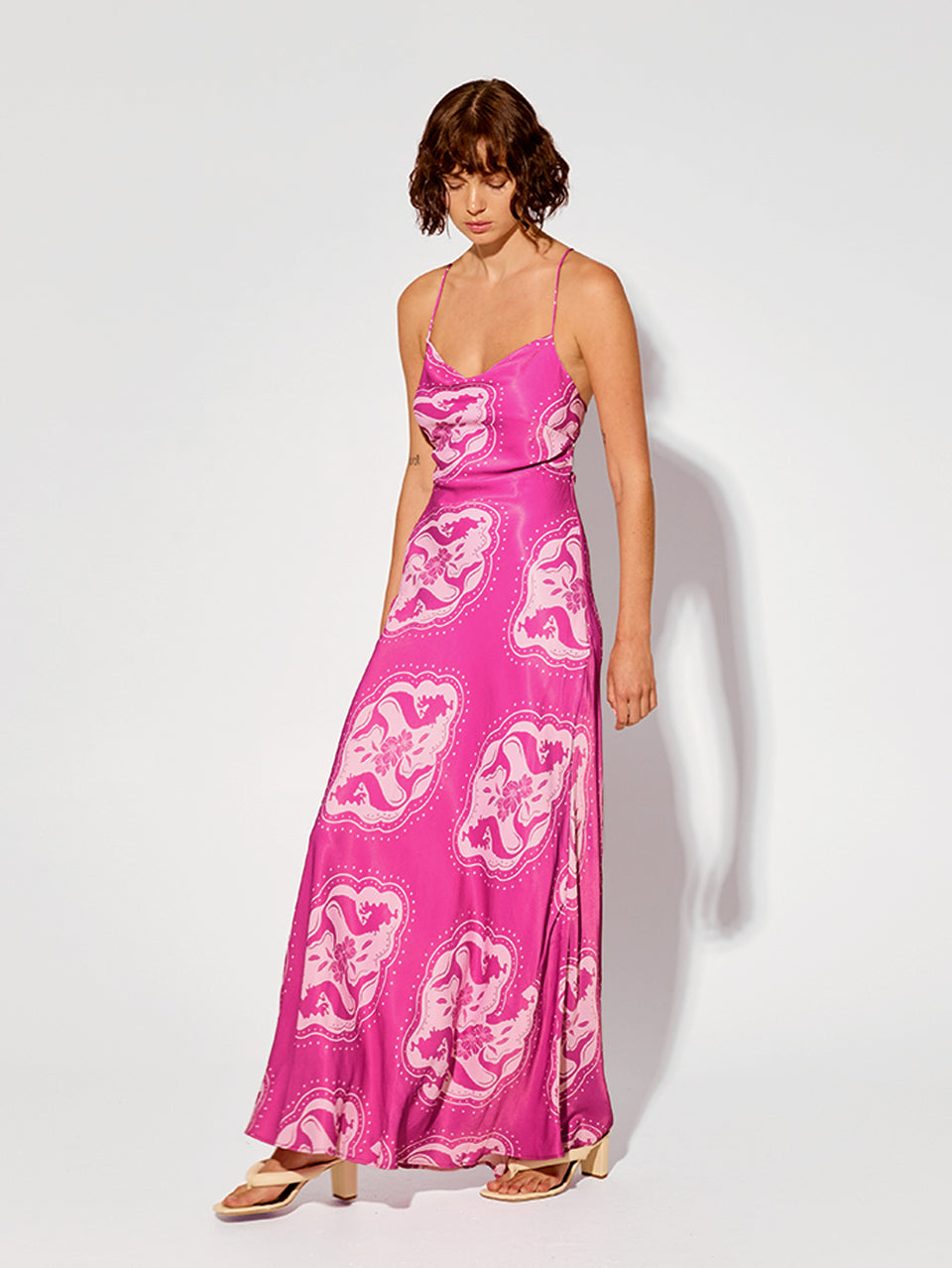 Isla Bias Maxi Dress KIVARI | Model wears purple bias maxi dress side view