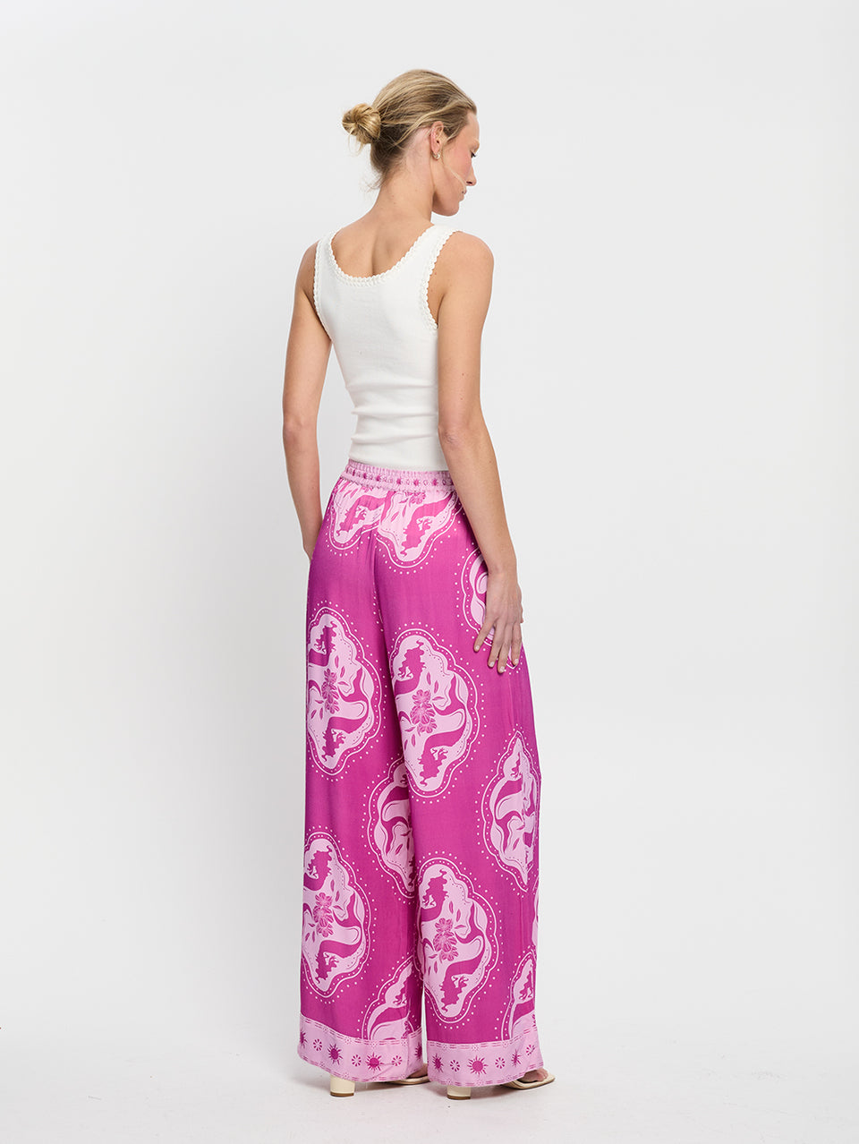 Isla Pant KIVARI | Model wears purple pant back view