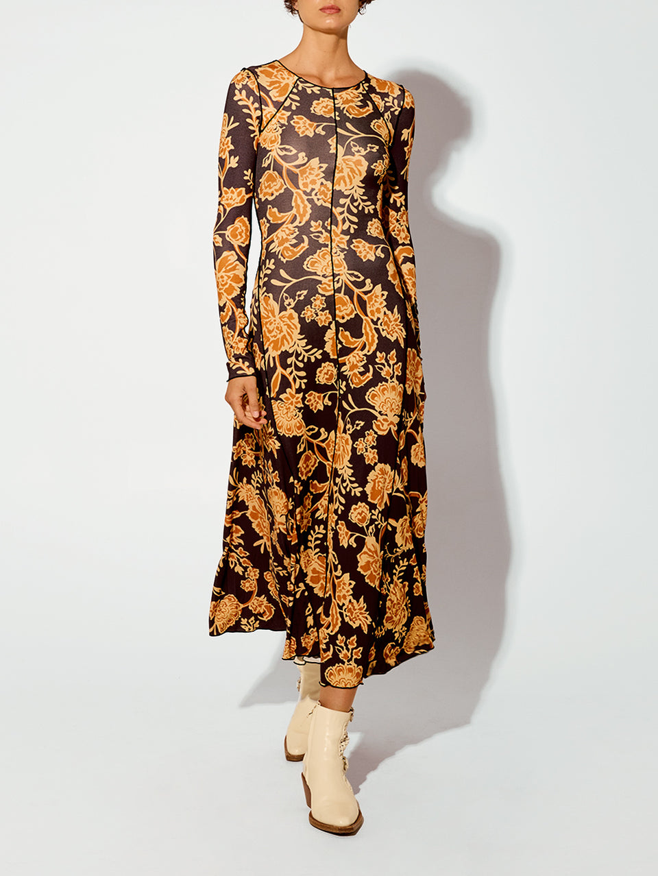 Kaia Knit Dress KIVARI | Model wears black and orange floral knit dress