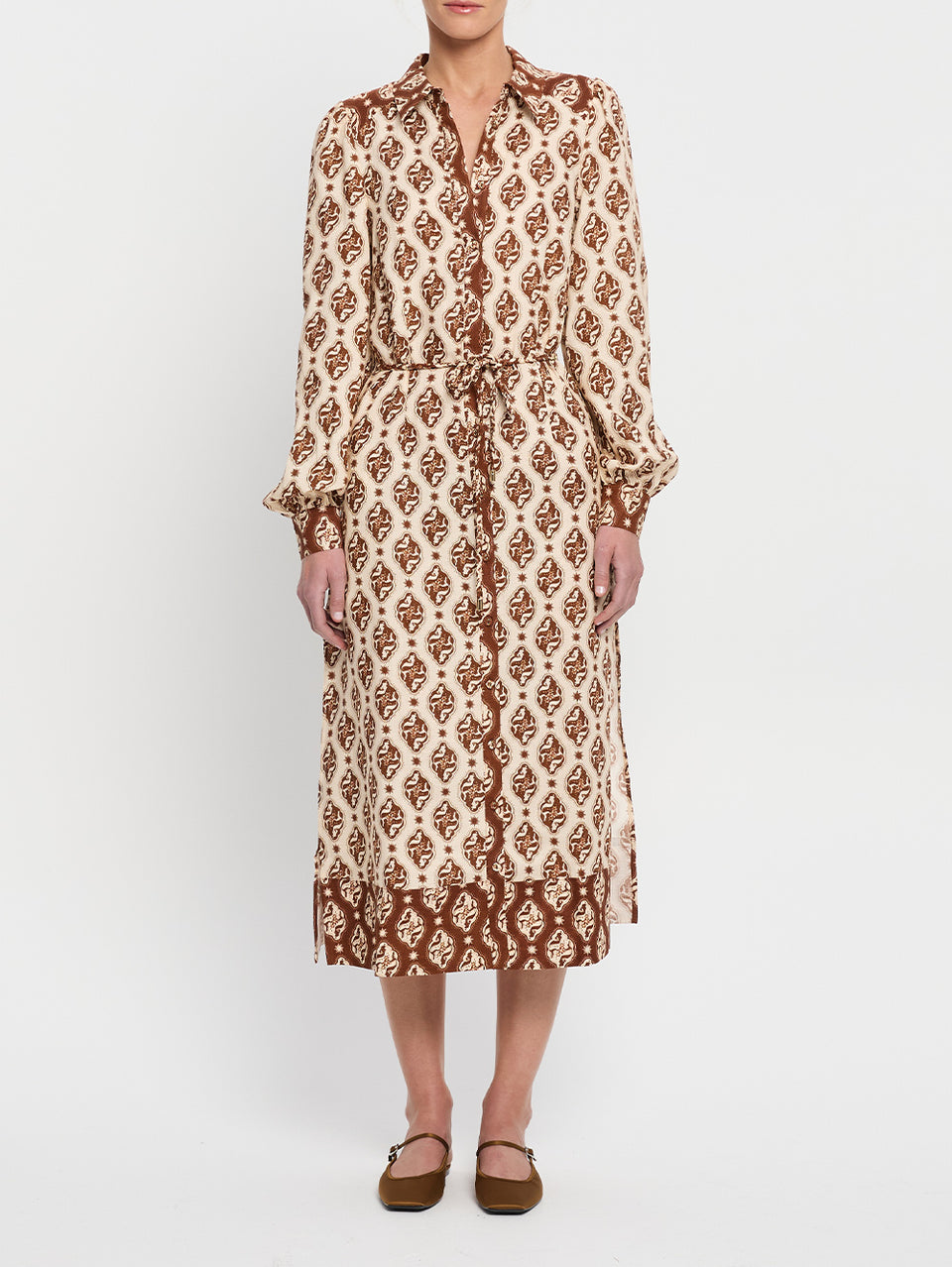 Melody Midi Dress KIVARI | Model wears brown and cream print midi dress 