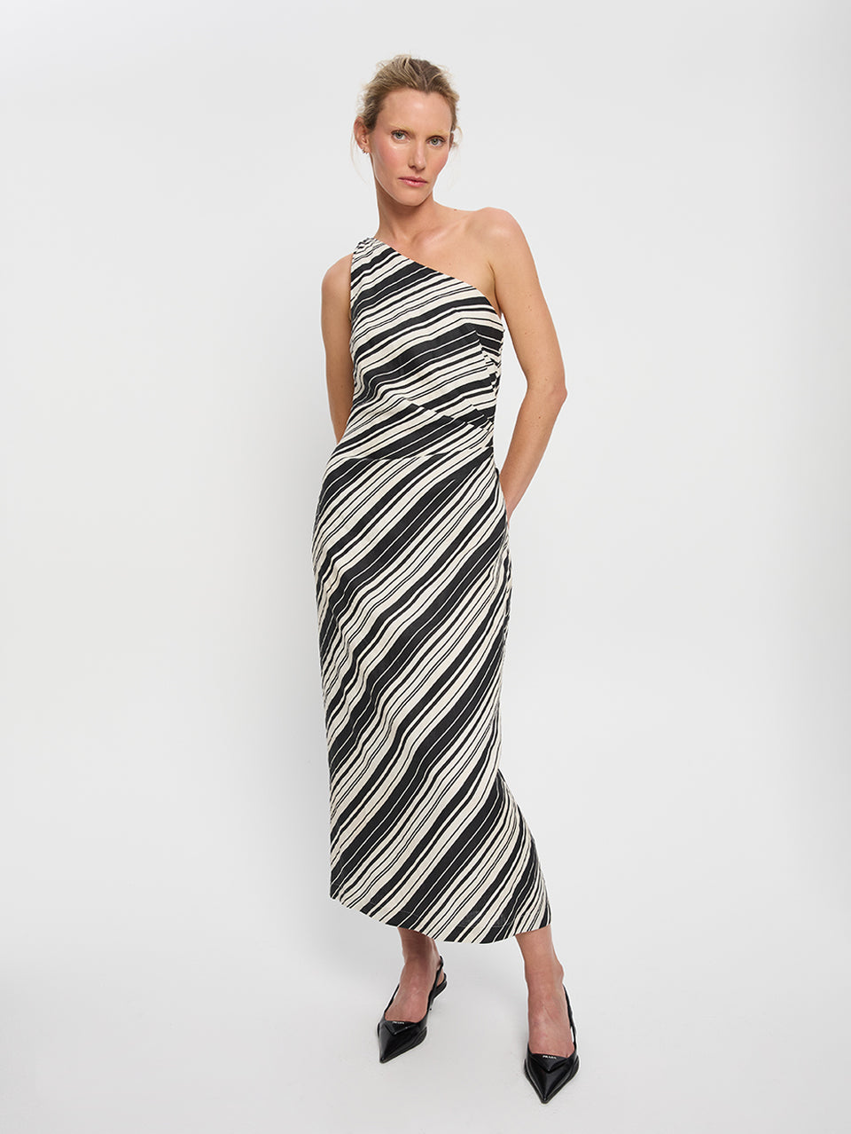 Sara Midi Dress KIVARI | Model wears stripe one shoulder linen midi dress