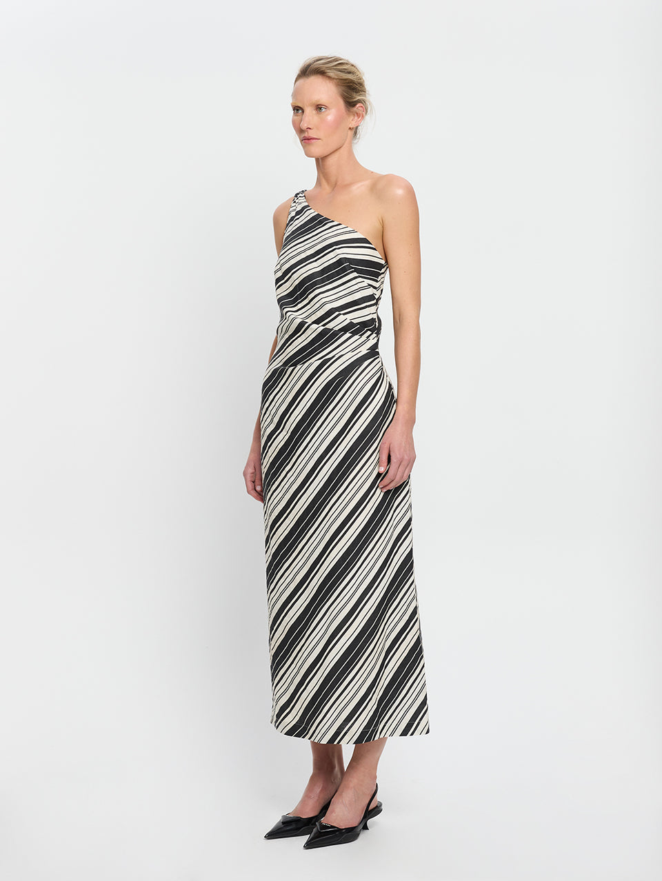 Sara Midi Dress KIVARI | Model wears stripe one shoulder linen midi dress side view