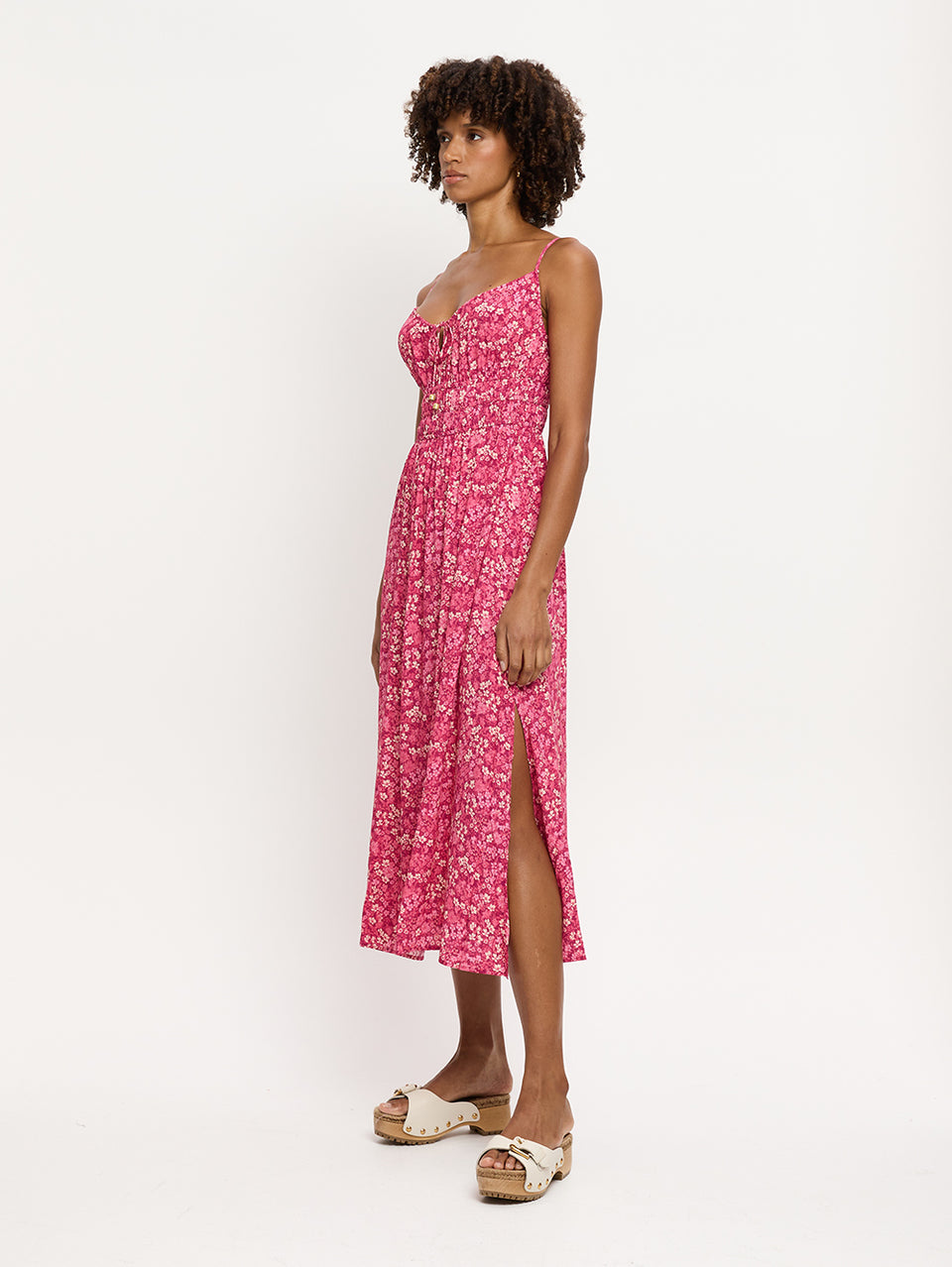 Tamara Strappy Midi Dress KIVARI | Model wears pink floral midi dress side view