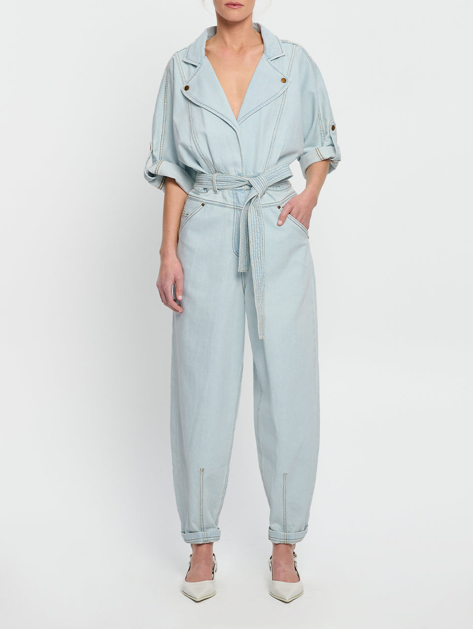 Adina Boilersuit Pale Blue KIVARI | Model wears light blue denim boilersuit